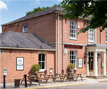 Social distancing signs in pub garden